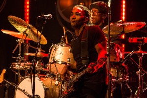 Amos Lee's band member performing at Uptown Theater in Kansas City, Missouri, on March 26, 2019.