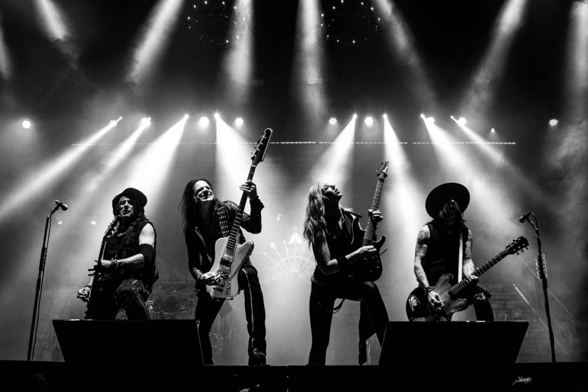 Guitarist Ryan Roxie, bass guiarist CHuck Garric, and guitarist Nita Strauss and Tommy Henricksen