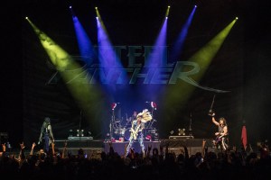 Steel Panther performing at the Arvest Bank Theatre at The Midland in Kansas City, Missouri on December 15, 2019.