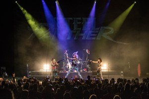 Steel Panther performing at the Arvest Bank Theatre at The Midland in Kansas City, Missouri on December 15, 2019.