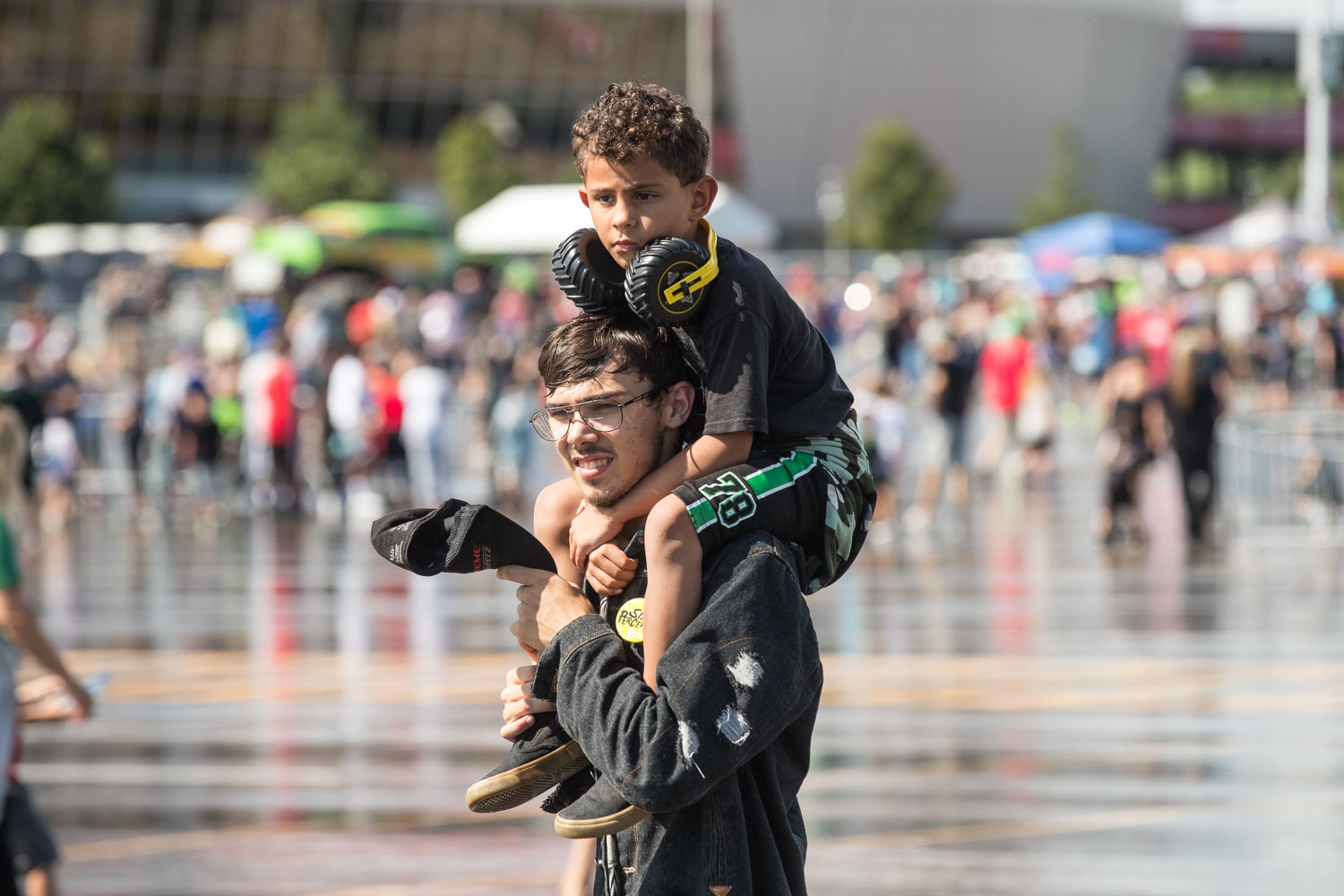 Fans wander around during the Monster Jam Pit Party prior to the main event at GEHA Field at Arrowhead on Saturday evening, June 26, 2021.