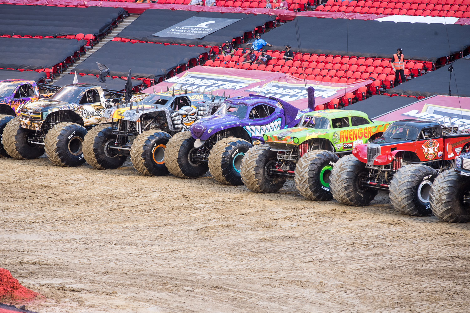 Monster Trucks are lined up during Monster Jam at GEHA Field at Arrowhead on Saturday evening, June 26, 2021.
