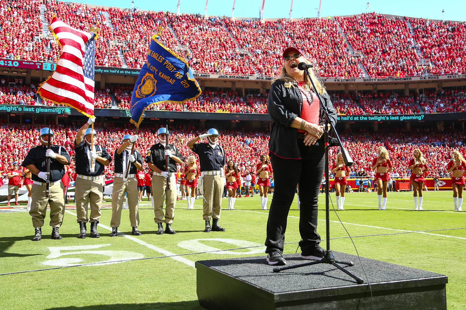 Melissa Etheridge singing the National Anthem prior to an NFL football game against the Los Angeles Chargers, Sunday, September 26, 2021 in Kansas City.
