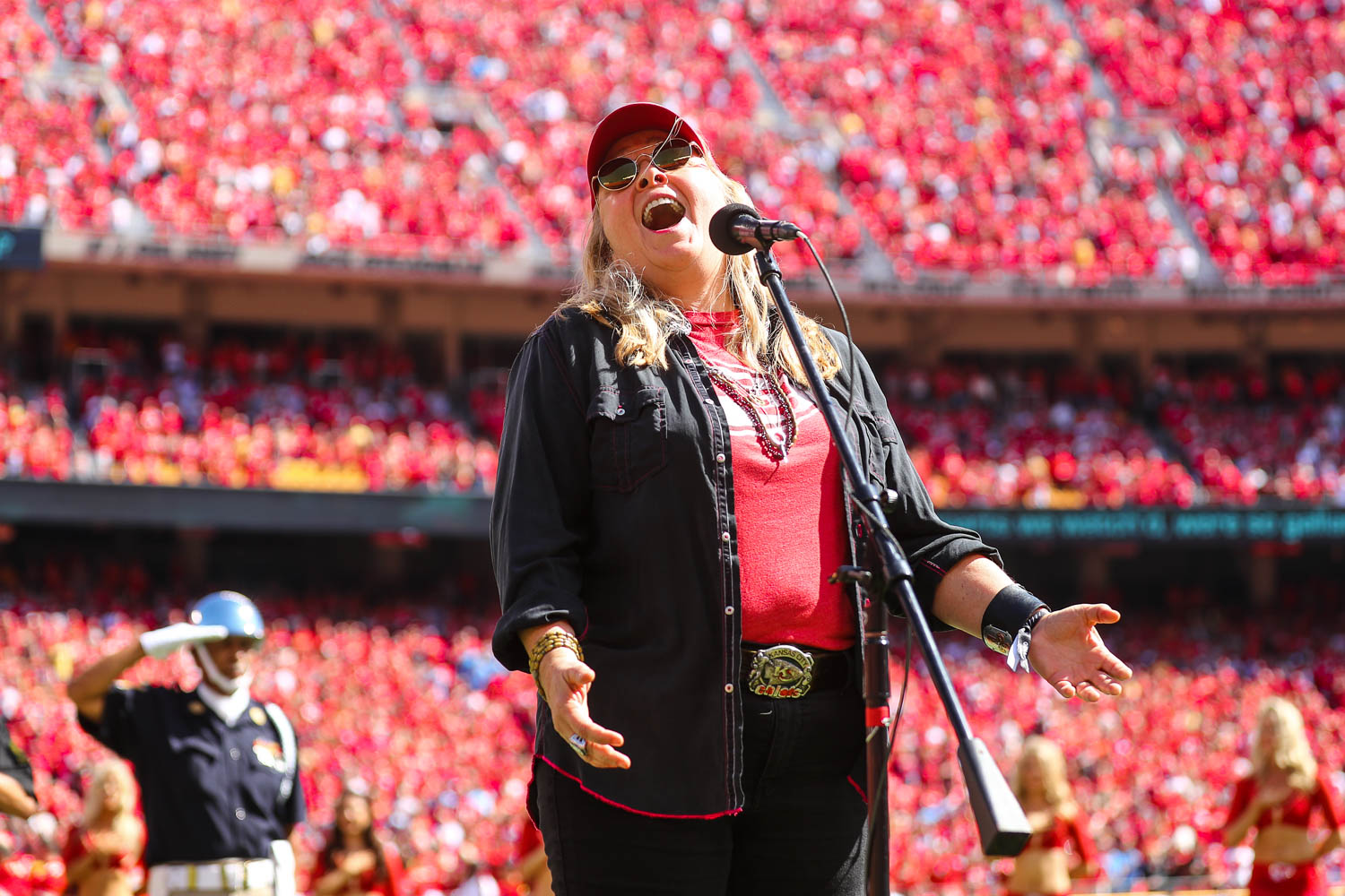 Melissa Etheridge singing the National Anthem prior to an NFL football game against the Los Angeles Chargers, Sunday, September 26, 2021 in Kansas City.
