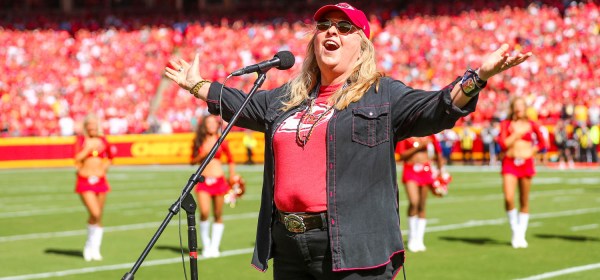 Melissa Etheridge singing the National Anthem prior to an NFL football game against the Los Angeles Chargers, Sunday, September 26, 2021 in Kansas City.