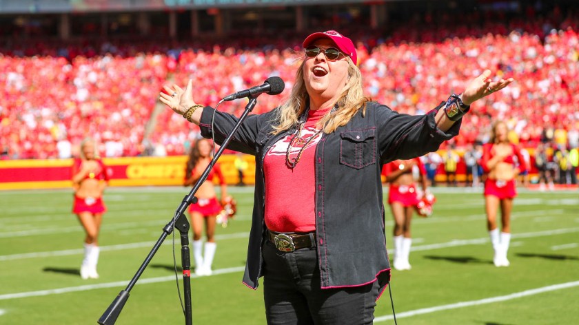 Melissa Etheridge singing the National Anthem prior to an NFL football game against the Los Angeles Chargers, Sunday, September 26, 2021 in Kansas City.