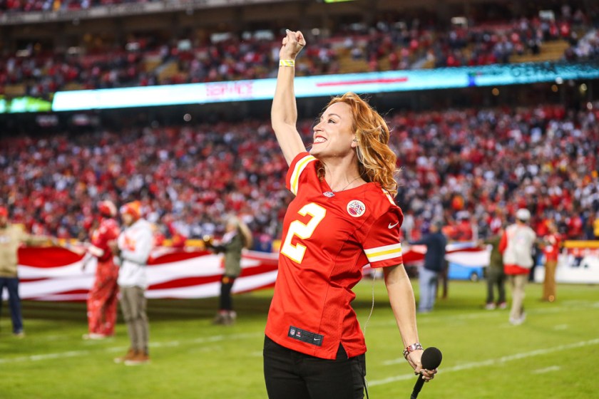 Casi Joy singing “God Bless America” at halftime during an NFL football game against the Dallas Cowboys, Sunday, November 21, 2021 in Kansas City.