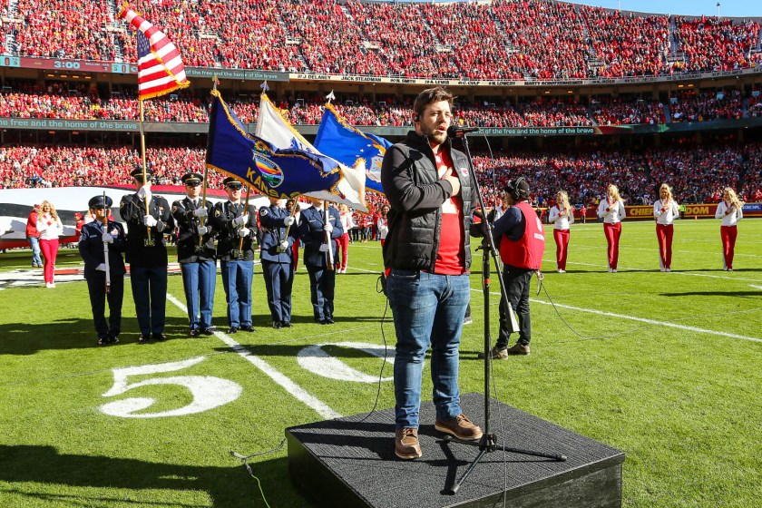 Country artist Kameron Marlowe singing the national anthem prior to an NFL football game against the Las Vegas Raiders, Sunday, December 12, 2021 in Kansas City.