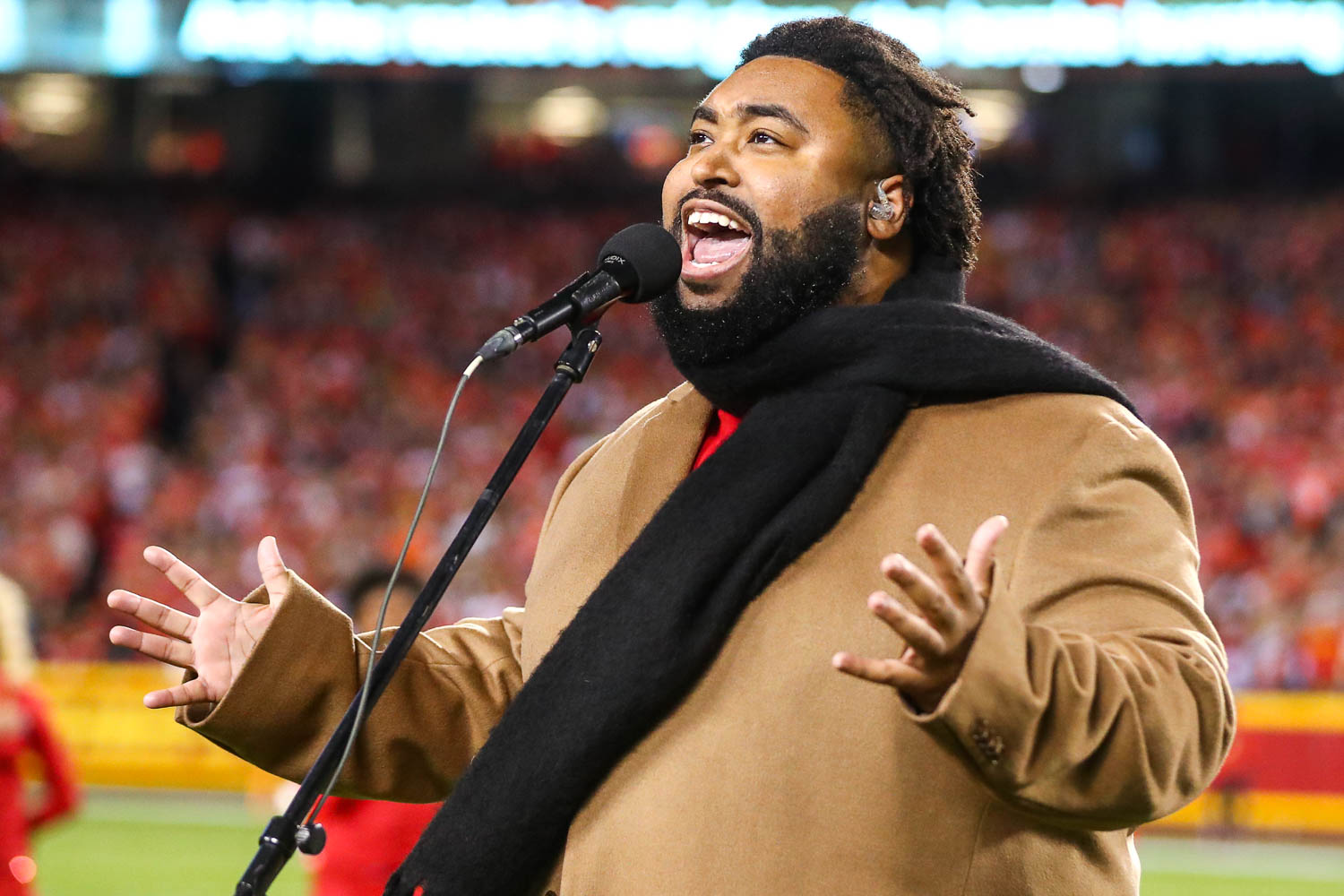 Singer/songwriter Matthew Johnson from The Voice singing the National Anthem prior to an NFL football game against the Denver Broncos, Sunday, December 5, 2021 in Kansas City.