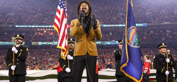 Cam Anthony, winner of season 20 of The Voice, sings the National Anthem prior to the wildcard playoff football game against the Pittsburgh Steelers, Sunday, January 16, 2022 in Kansas City.