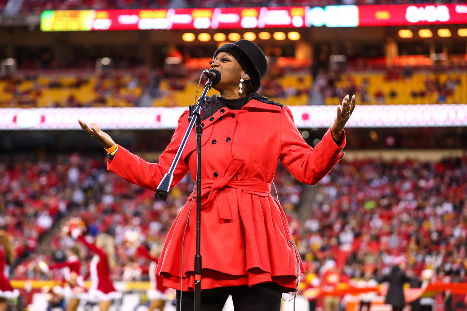 Singer/songwriter Symonne Sparks sings a holiday medley at halftime during an NFL football game against the Pittsburgh Steelers, Sunday, December 26, 2021 in Kansas City.