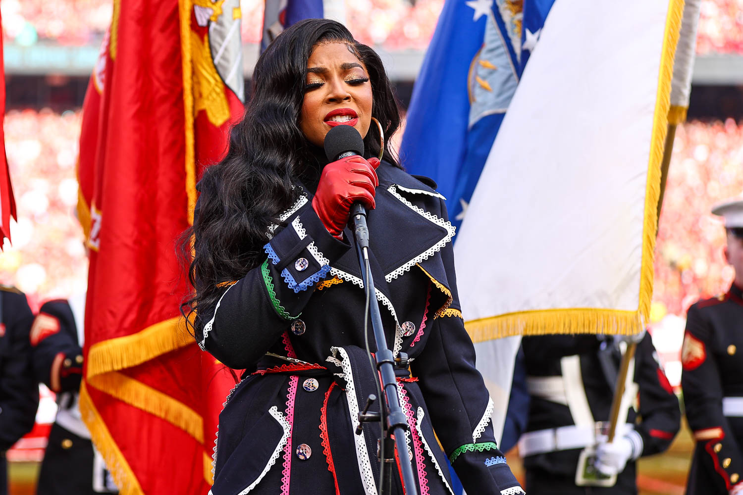 Ashanti singing the National Anthem prior to the AFC Championship football game against the Cincinnati Bengals, Sunday, January 30, 2022 in Kansas City.