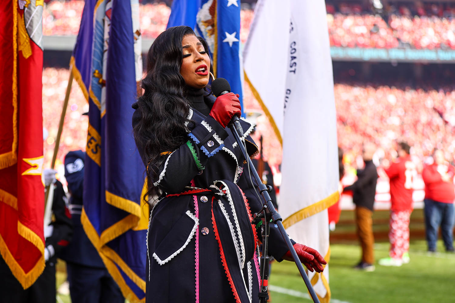 Ashanti singing the National Anthem prior to the AFC Championship football game against the Cincinnati Bengals, Sunday, January 30, 2022 in Kansas City.