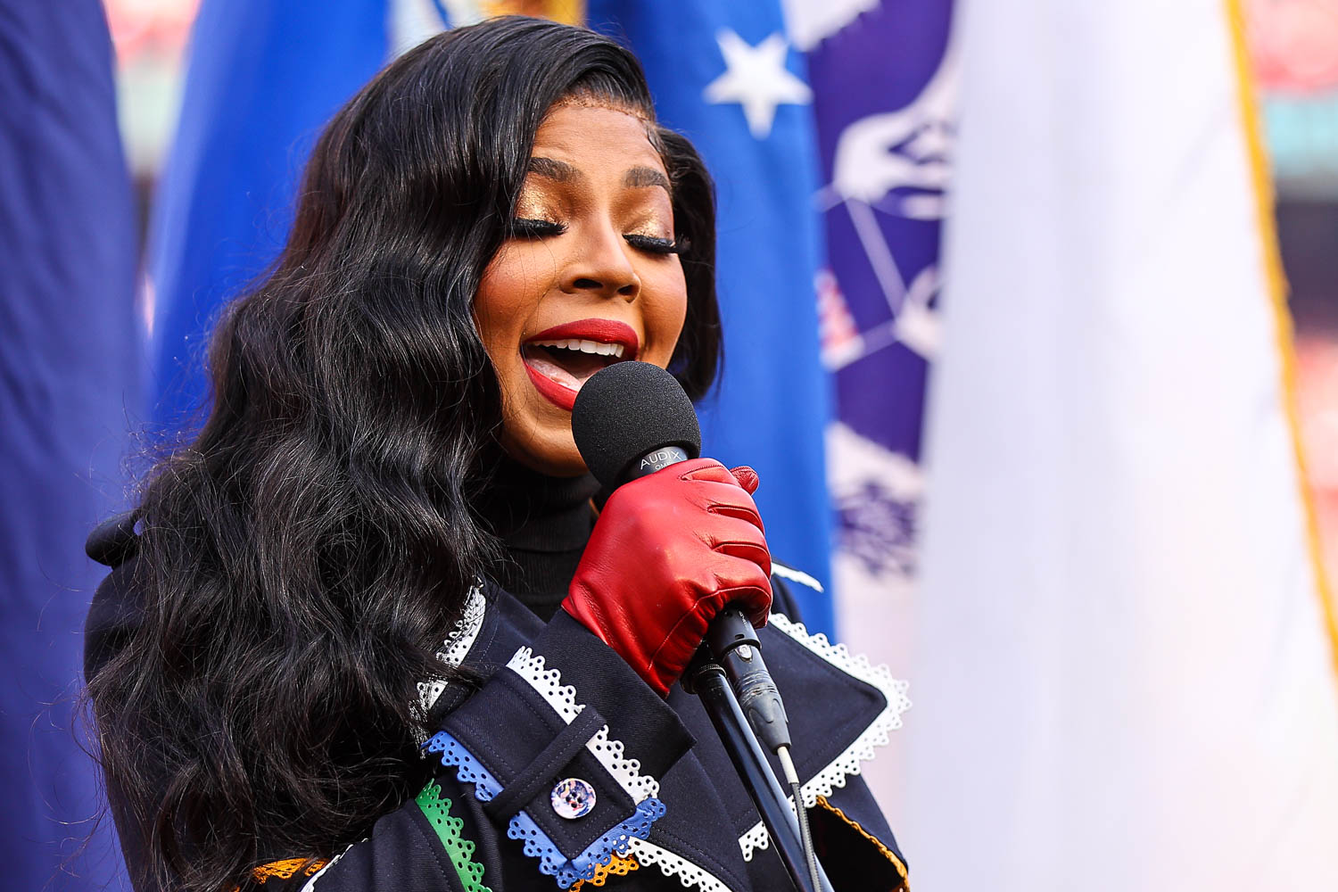 Ashanti singing the National Anthem prior to the AFC Championship football game against the Cincinnati Bengals, Sunday, January 30, 2022 in Kansas City.
