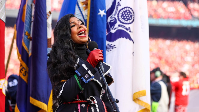 Ashanti singing the National Anthem prior to the AFC Championship football game against the Cincinnati Bengals, Sunday, January 30, 2022 in Kansas City.