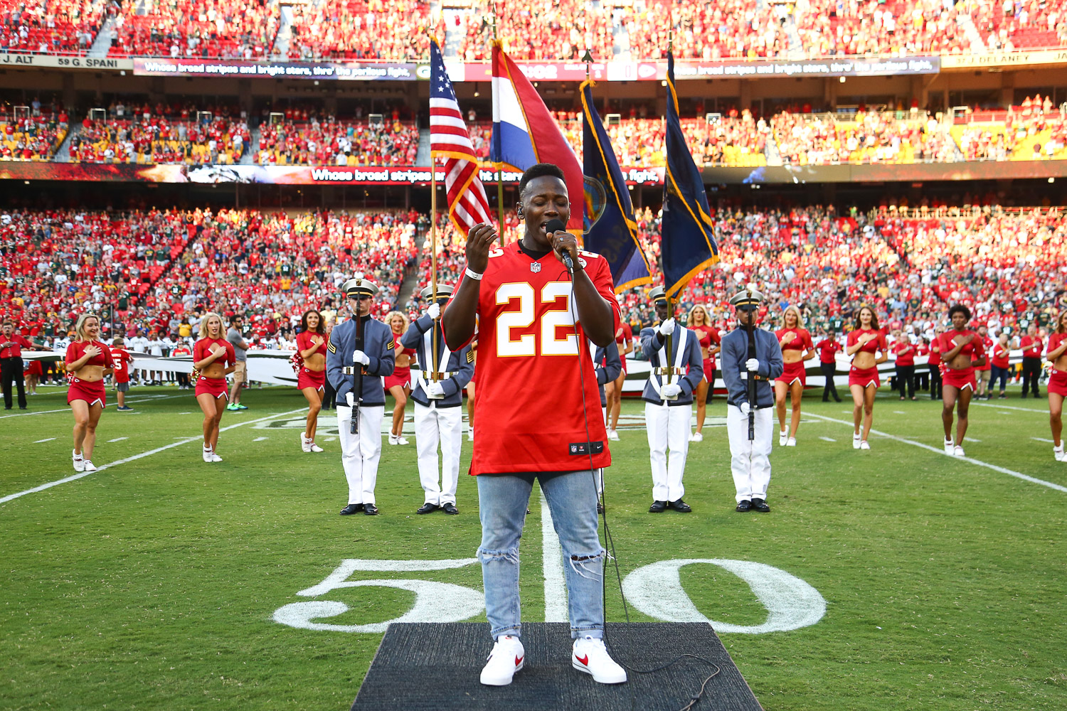 Nashville recording artist Brian Nhira singing the National Anthem prior to an NFL preseason football game against the Green Bay Packers, Thursday, August 25, 2022 in Kansas City.