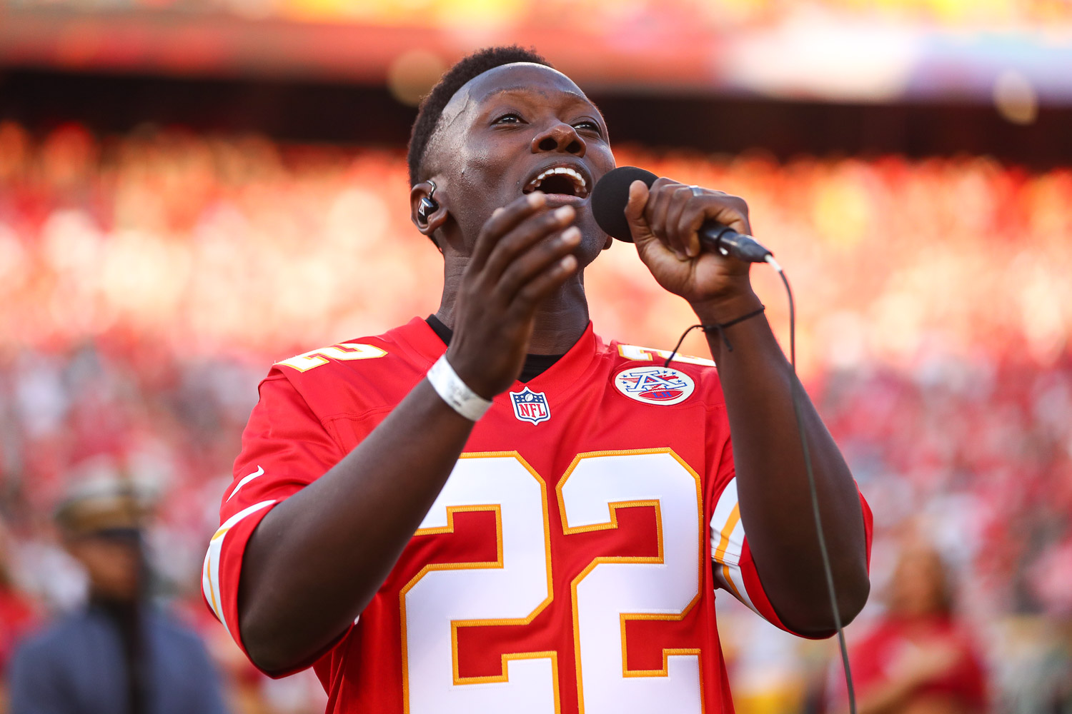 Nashville recording artist Brian Nhira singing the National Anthem prior to an NFL preseason football game against the Green Bay Packers, Thursday, August 25, 2022 in Kansas City.