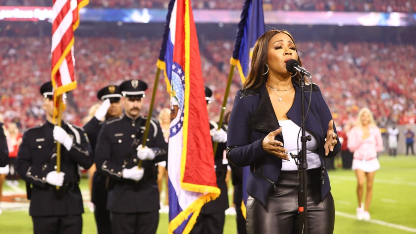 GRAMMY winning artist Erica Campbell singing the National Anthem prior to an NFL football game against the Las Vegas Raiders, Monday, October 10, 2022 in Kansas City.