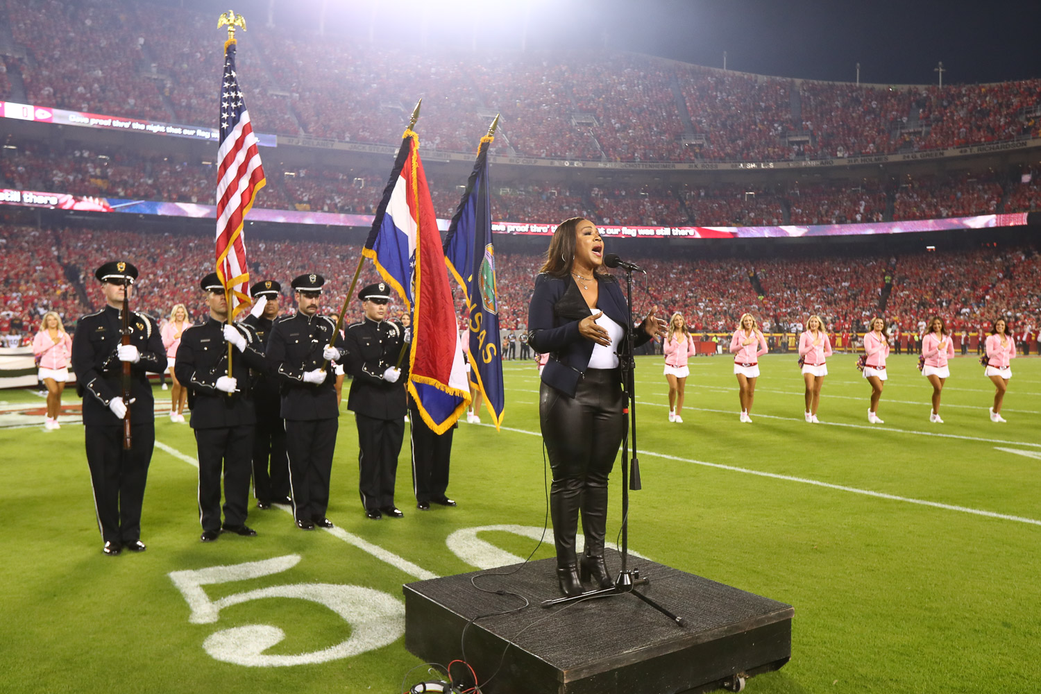GRAMMY winning artist Erica Campbell singing the National Anthem prior to an NFL football game against the Las Vegas Raiders, Monday, October 10, 2022 in Kansas City.