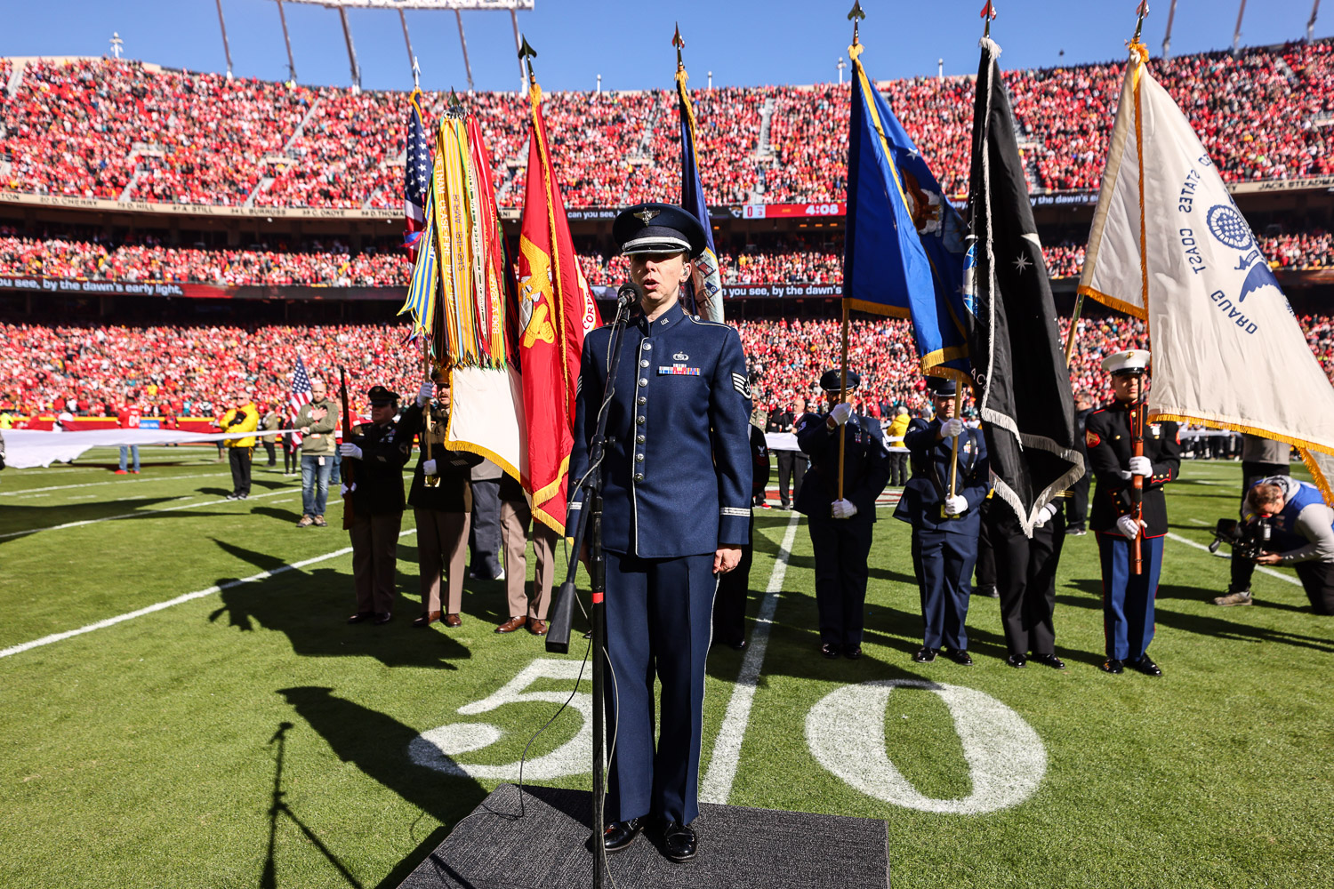 United States Air Force Staff Sergeant Melissa Griffith sings the national anthem prior to an NFL football game against the Jacksonville Jaguars, Sunday, November 13, 2022 in Kansas City.