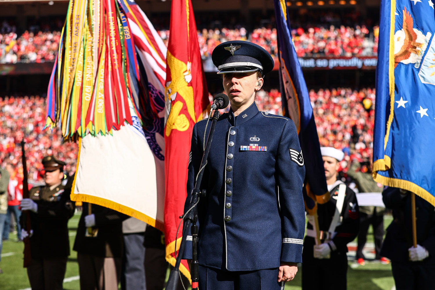 United States Air Force Staff Sergeant Melissa Griffith sings the national anthem prior to an NFL football game against the Jacksonville Jaguars, Sunday, November 13, 2022 in Kansas City.