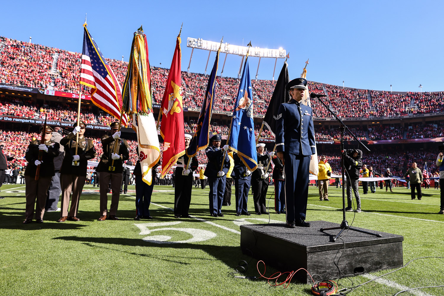 United States Air Force Staff Sergeant Melissa Griffith sings the national anthem prior to an NFL football game against the Jacksonville Jaguars, Sunday, November 13, 2022 in Kansas City.
