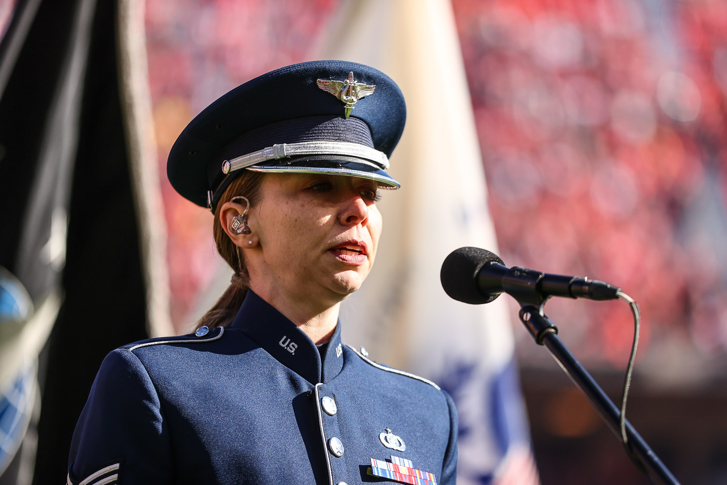 United States Air Force Staff Sergeant Melissa Griffith sings the national anthem prior to an NFL football game against the Jacksonville Jaguars, Sunday, November 13, 2022 in Kansas City.