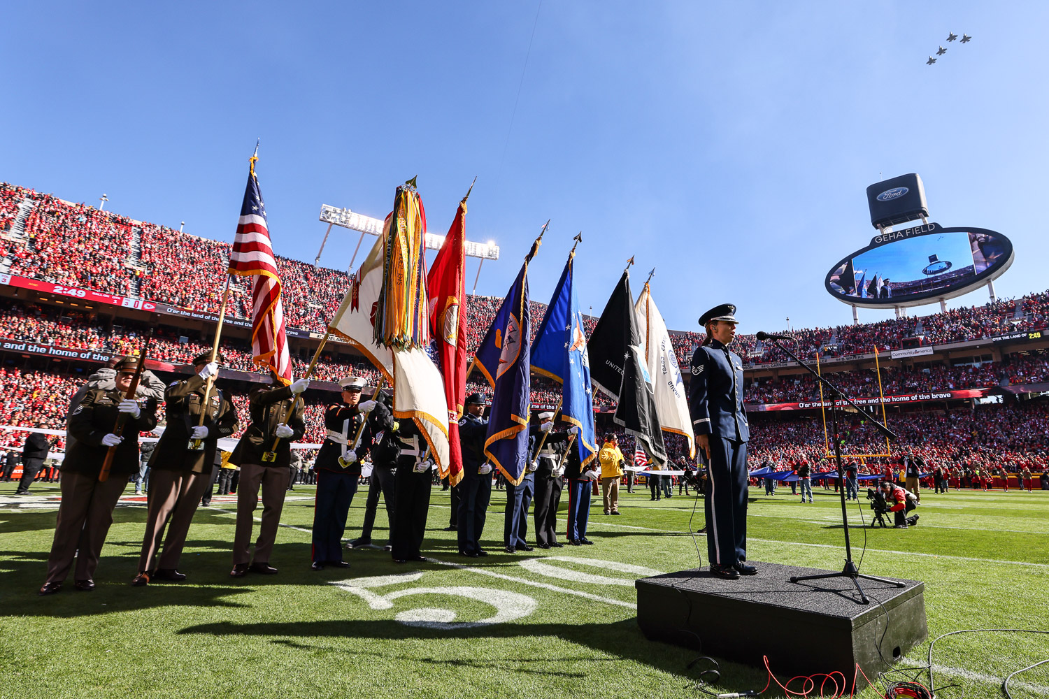 United States Air Force Staff Sergeant Melissa Griffith sings the national anthem prior to an NFL football game against the Jacksonville Jaguars, Sunday, November 13, 2022 in Kansas City.