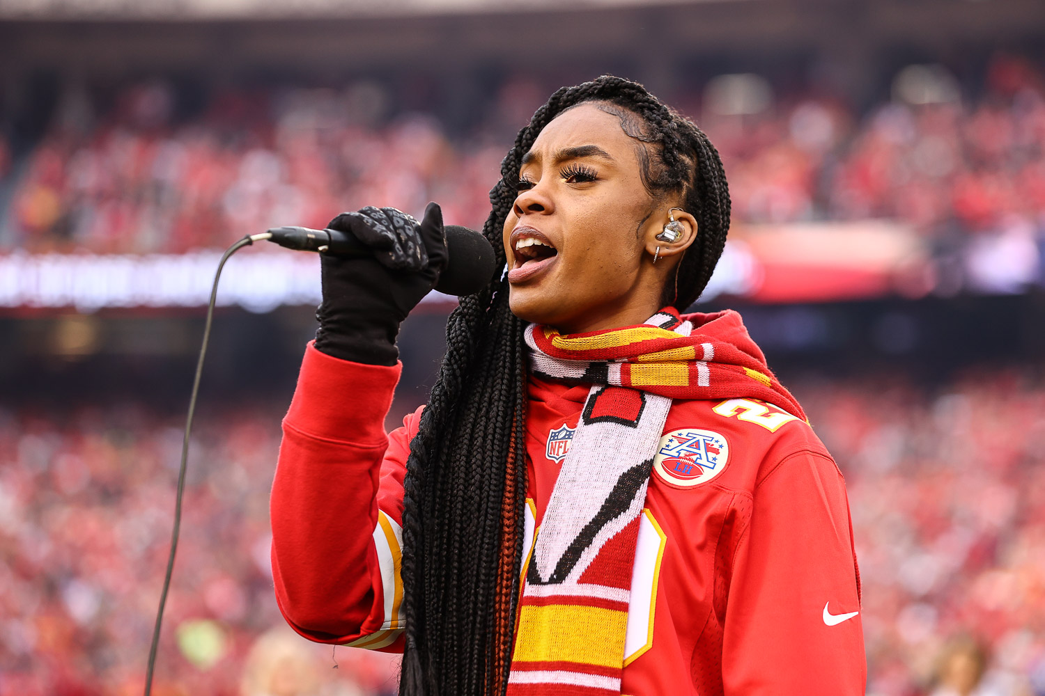Season 15 winner of 'The Voice' Kennedy Holmes sings the national anthem prior to an NFL football game against the Los Angeles Rams Sunday, November 27, 2022 in Kansas City.