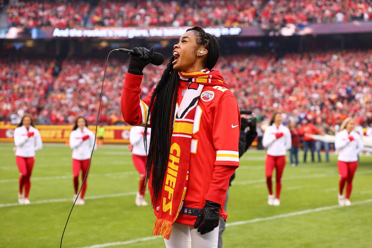 Season 15 winner of 'The Voice' Kennedy Holmes sings the national anthem prior to an NFL football game against the Los Angeles Rams Sunday, November 27, 2022 in Kansas City.