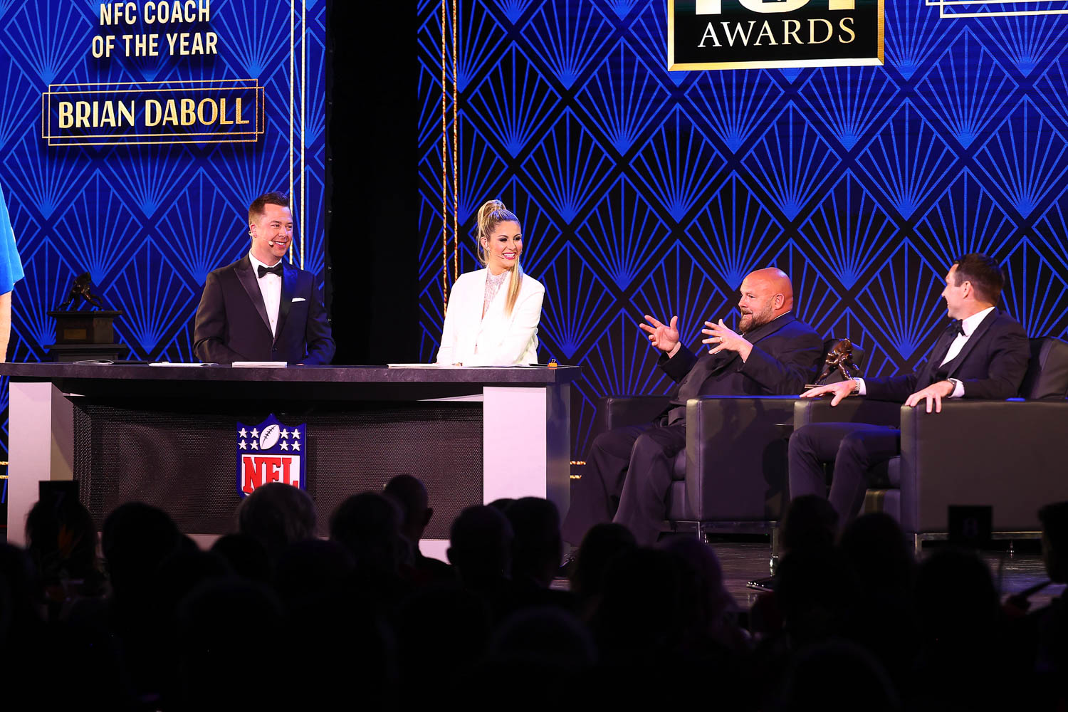 James Palmer and Laura Rutledge with NFC Coach of the Year award recipient New York Giants head coach Brian Daboll during the 53rd annual 101 Awards at The Westin Crown Center in Kansas City, Missouri on Saturday, February 25, 2023.
