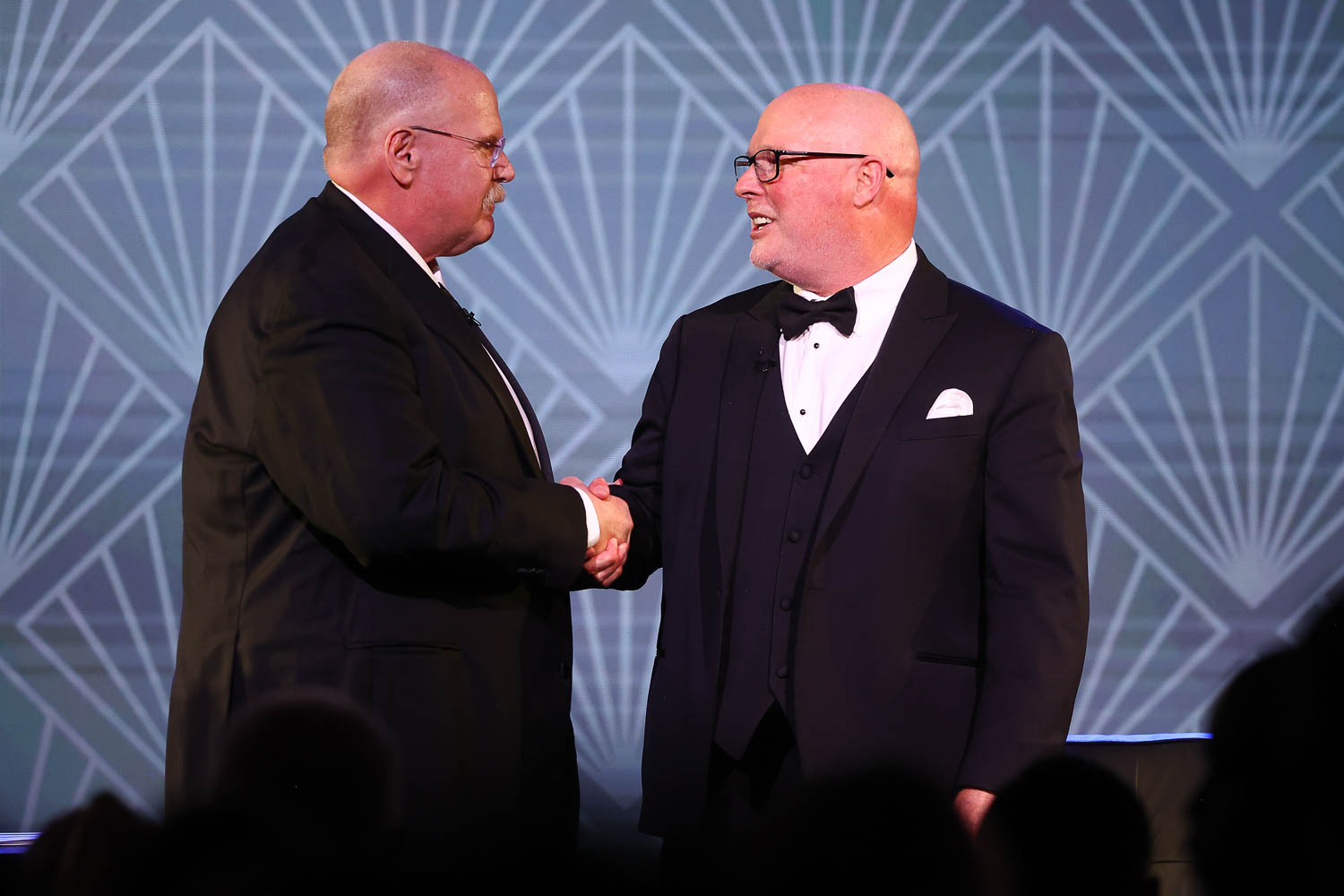 Kansas City Chiefs Head Coach Andy Reid with Mike Madden who is receiving the Lamar Hunt Award for Professional Football for his late father John Madden during the 53rd annual 101 Awards at The Westin Crown Center in Kansas City, Missouri on Saturday, February 25, 2023.