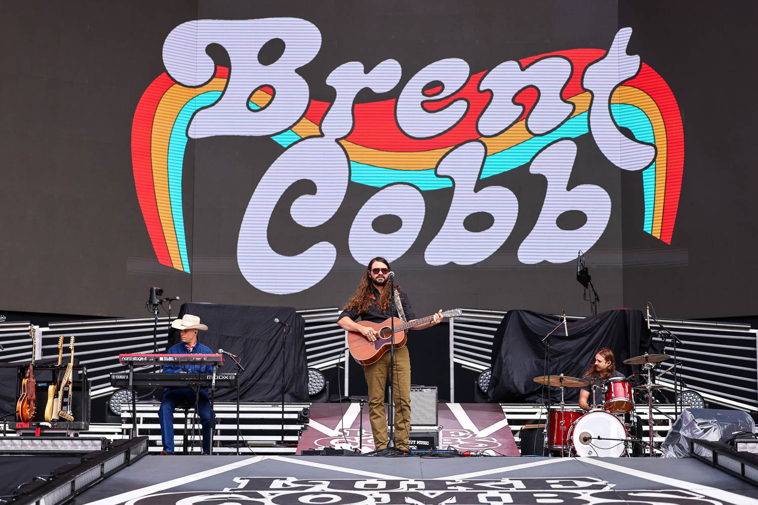 Brent Cobb performing at GEHA Field at Arrowhead Stadium in Kansas City, Missouri on June 10, 2023.