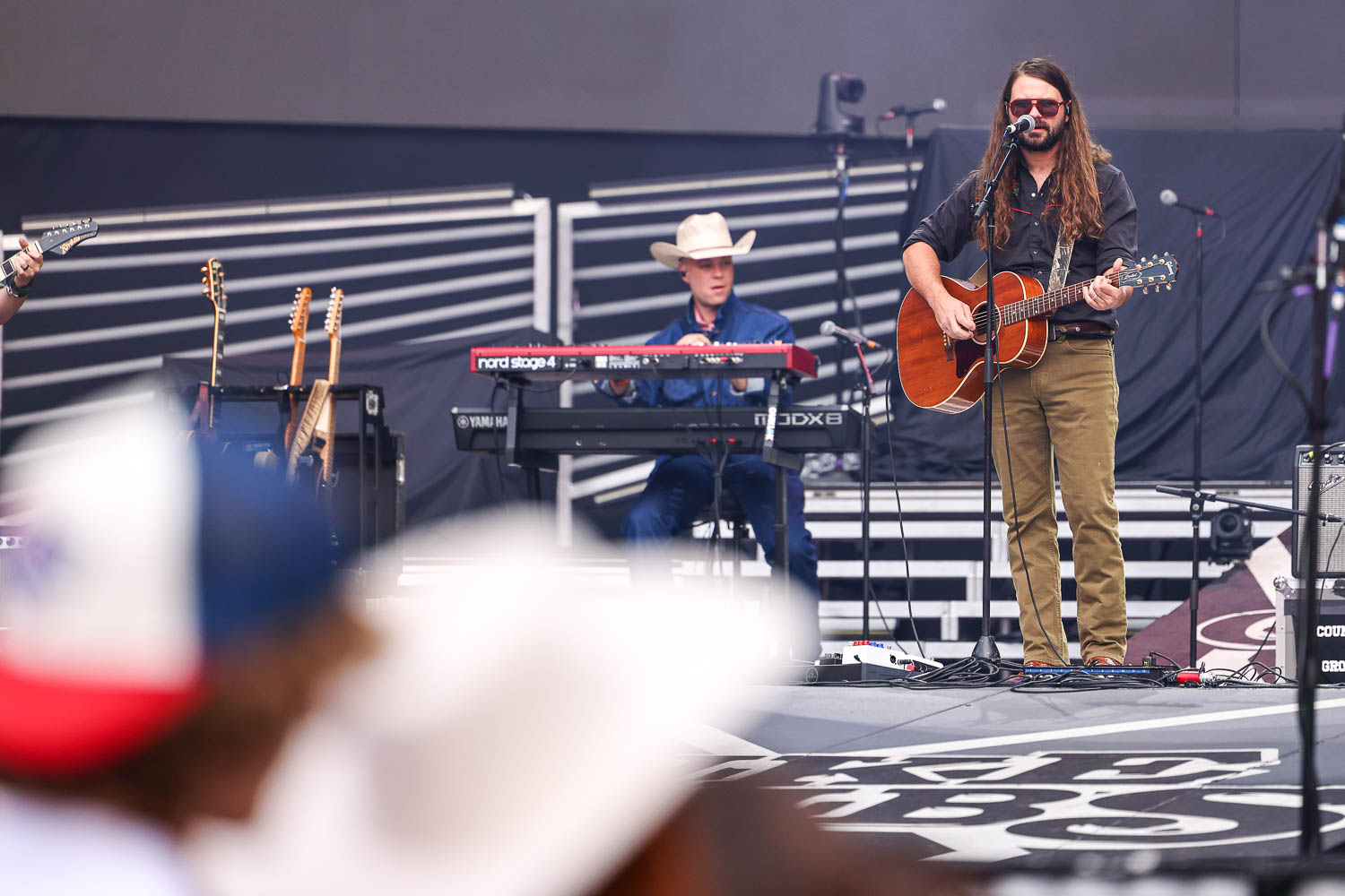 Brent Cobb performing at GEHA Field at Arrowhead Stadium in Kansas City, Missouri on June 10, 2023.