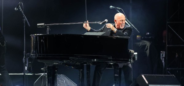 Billy Joel performing at GEHA Field at Arrowhead Stadium on Saturday, August 19, 2023.