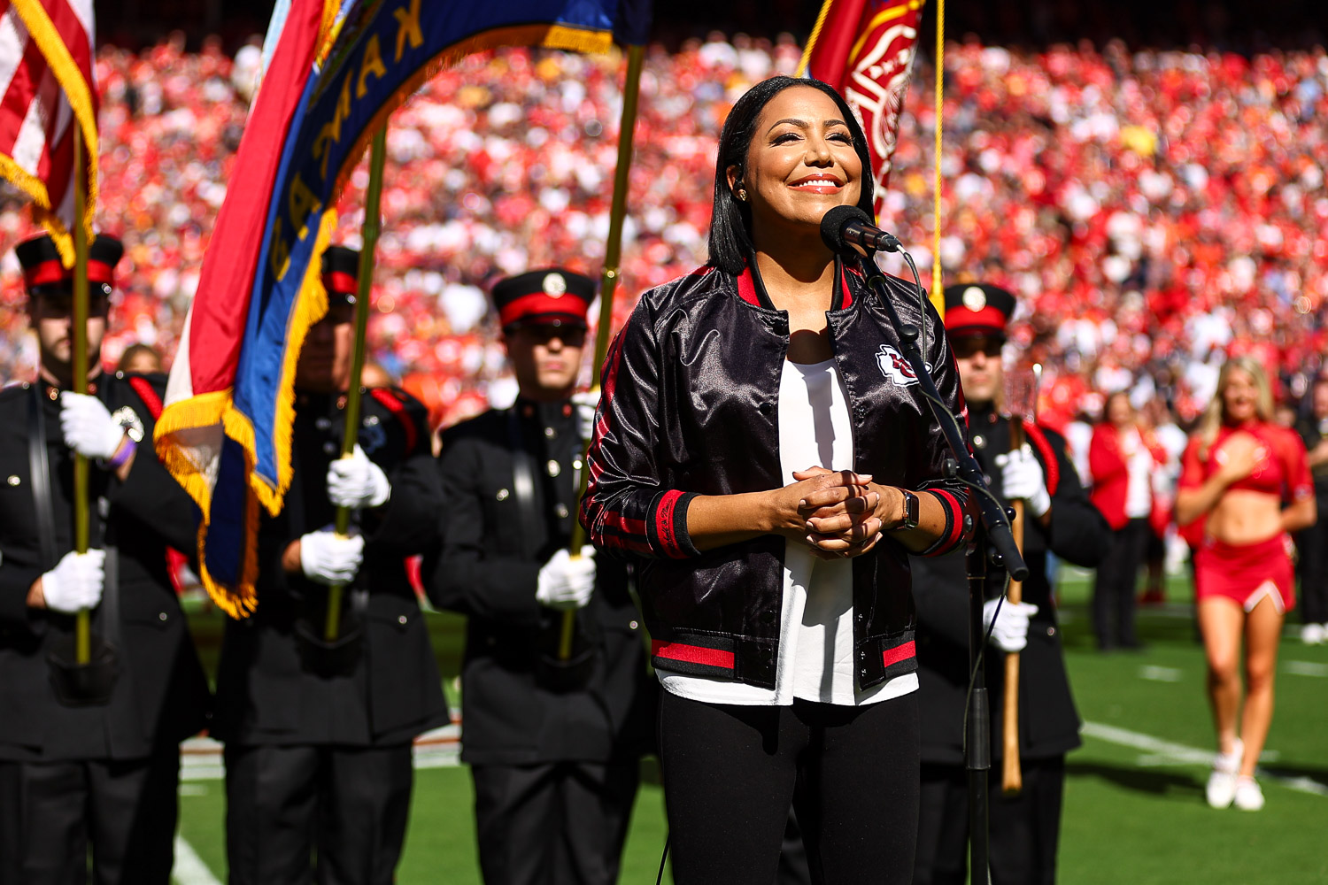 Good Morning America reporter and Army Reserve Major Stephanie Ramos sings the national anthem prior to the week three NFL football game against the Chicago Bears, Sunday, September 26, 2023 in Kansas City.