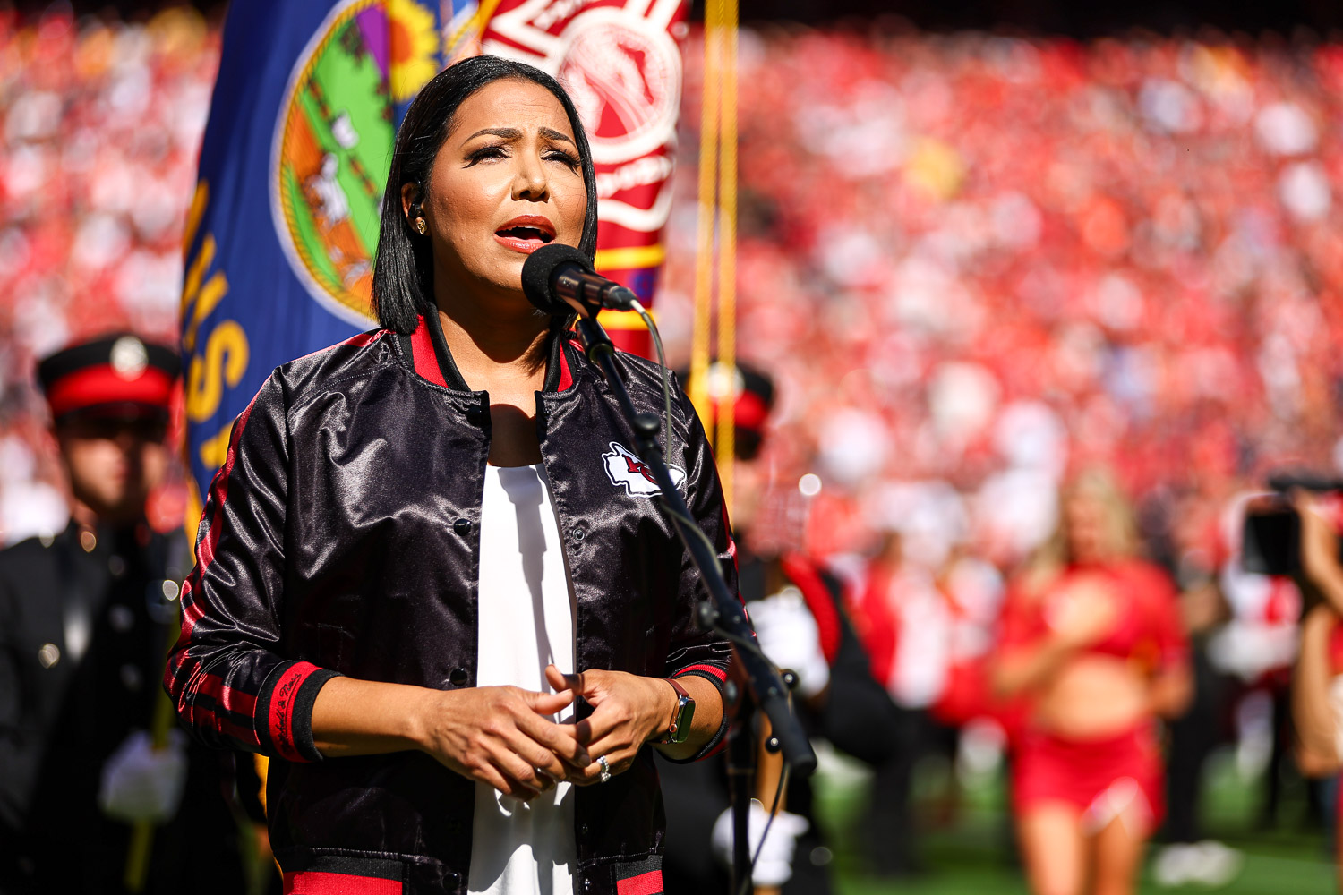 Good Morning America reporter and Army Reserve Major Stephanie Ramos sings the national anthem prior to the week three NFL football game against the Chicago Bears, Sunday, September 26, 2023 in Kansas City.