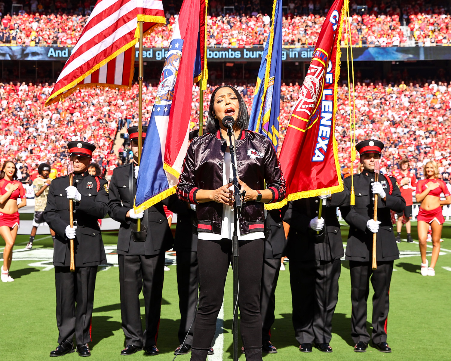Good Morning America reporter and Army Reserve Major Stephanie Ramos sings the national anthem prior to the week three NFL football game against the Chicago Bears, Sunday, September 26, 2023 in Kansas City.