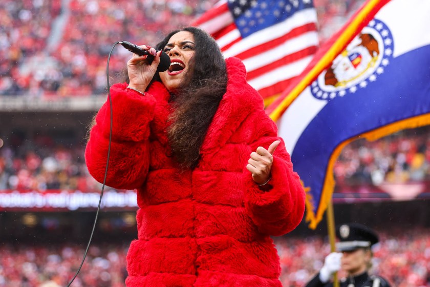 American Idol season 16 contestant, Britney Holmes, sings the national anthem prior to the NFL Week 16 matchup against the Las Vegas Raiders on December 25, 2023.