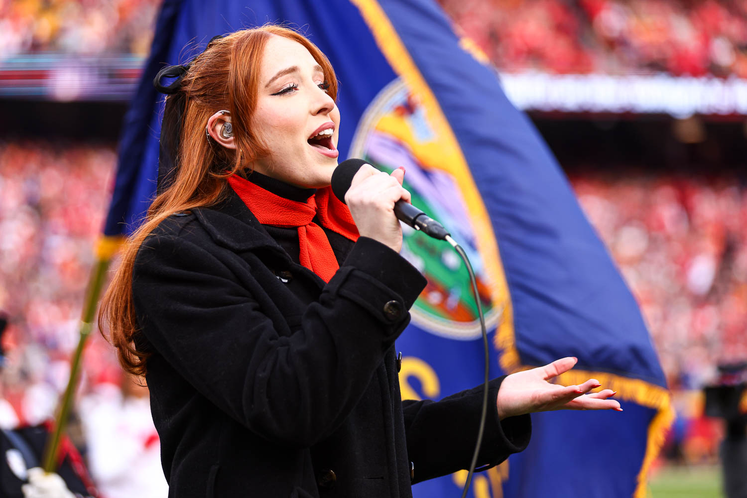 Season 21 contestant of American Idol Olivia Soli sings the national anthem prior to the week 14 NFL football game against the Buffalo Bills, December 10, 2023 in Kansas City.