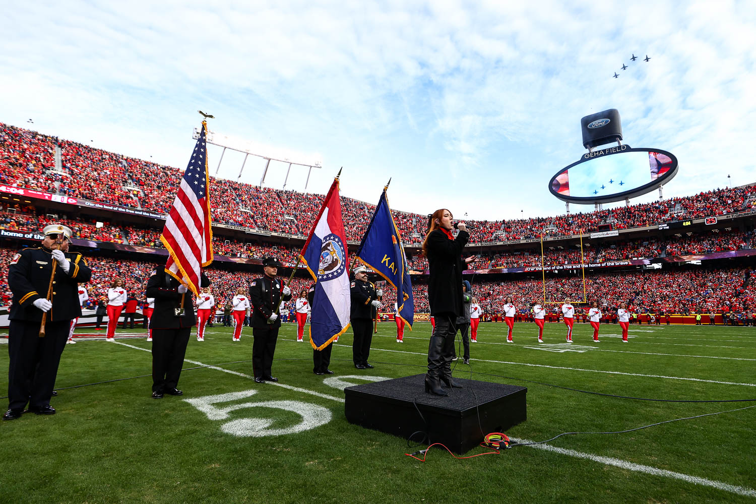 Season 21 contestant of American Idol Olivia Soli sings the national anthem prior to the week 14 NFL football game against the Buffalo Bills, December 10, 2023 in Kansas City.
