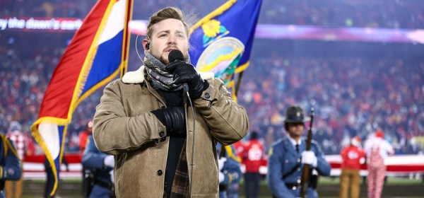 Country singer-songwriter Kameron Marlowe sings the national anthem prior to the NFL Wildcard Playoff football game against the Miami Dolphins, January 13, 2024 in Kansas City.