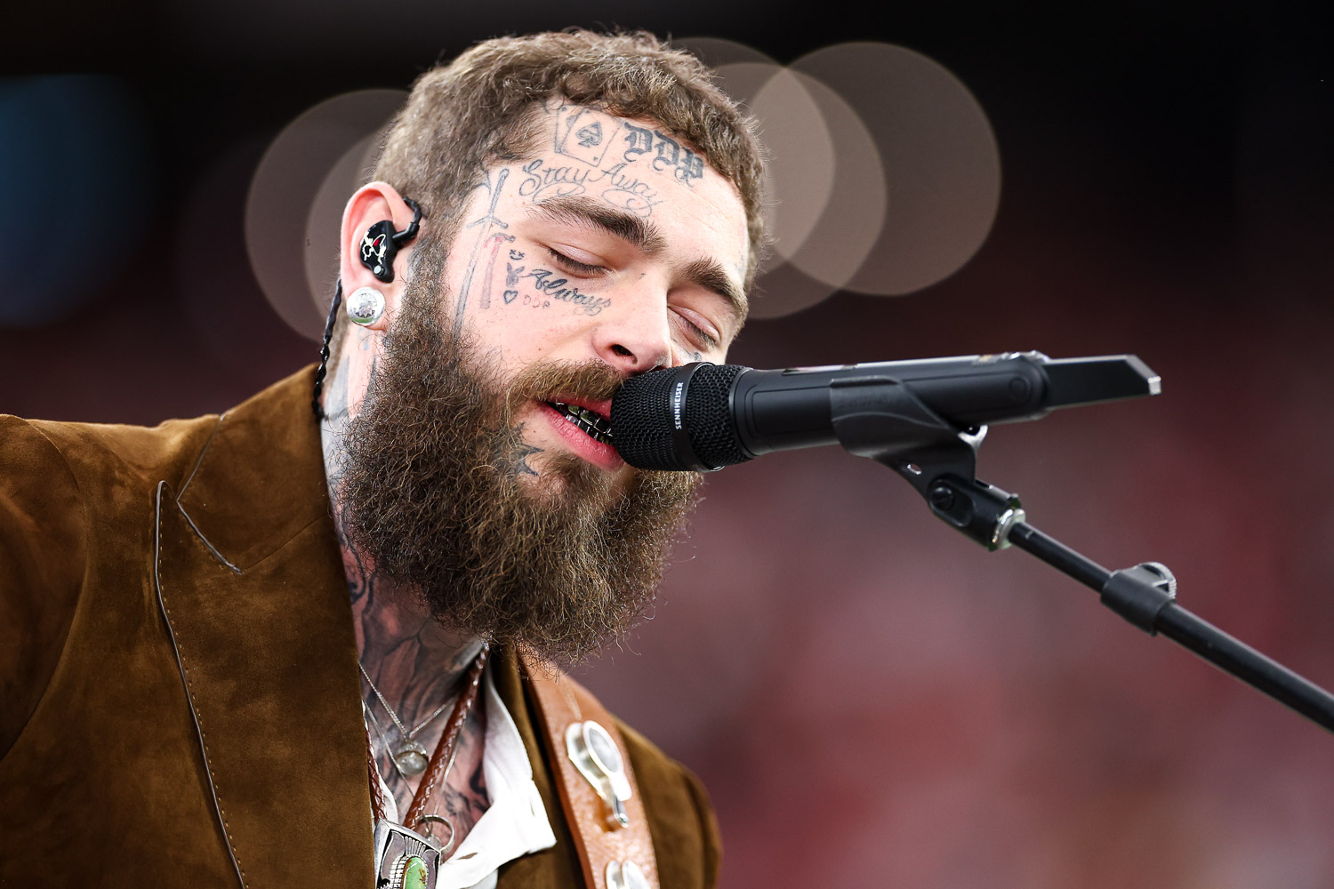 Post Malone sings “America the Beautiful” prior to the NFL Super Bowl 58 football game between the Kansas City Chiefs and the San Francisco 49ers, Sunday, Feb. 11, 2024, in Las Vegas.