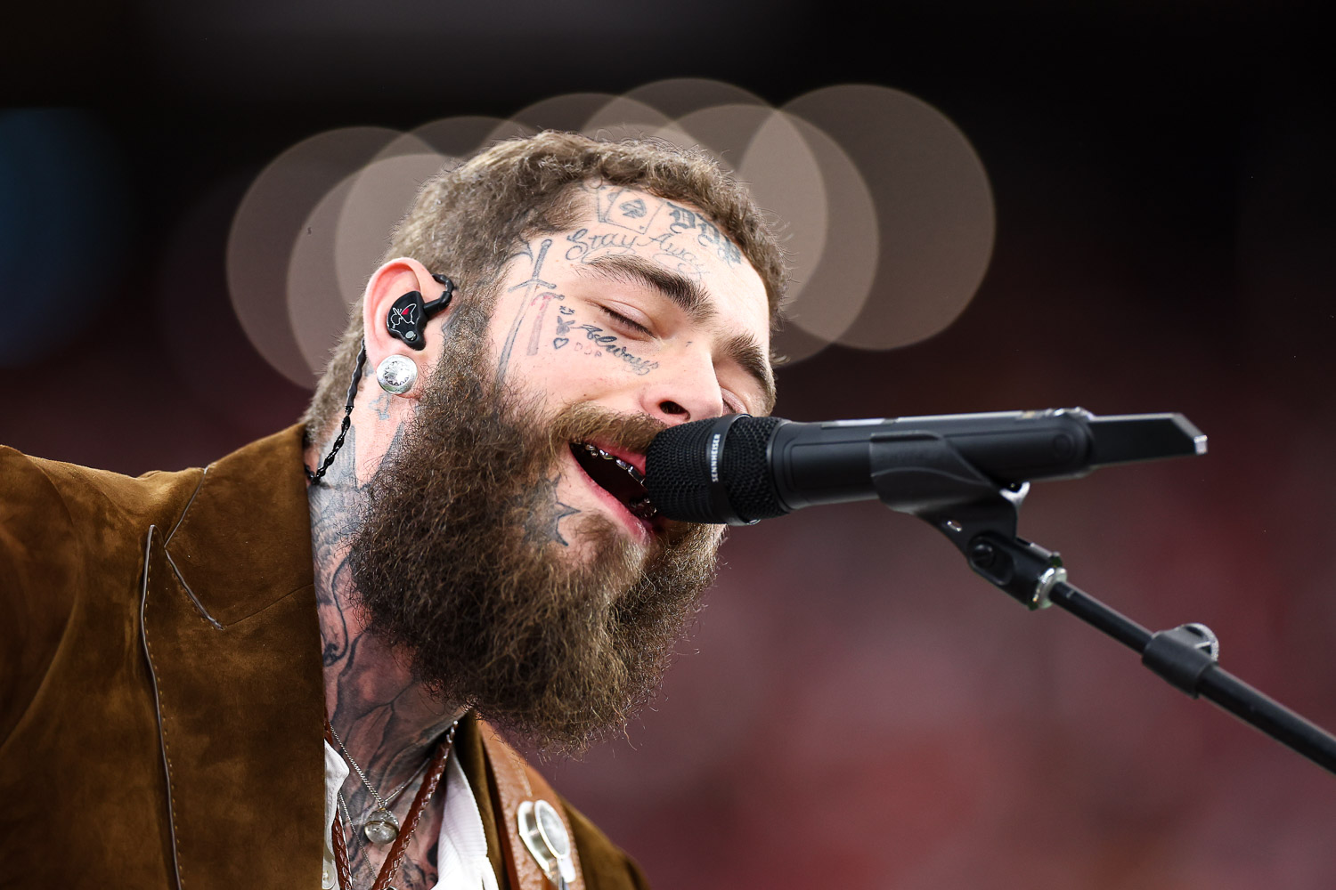 Post Malone sings “America the Beautiful” prior to the NFL Super Bowl 58 football game between the Kansas City Chiefs and the San Francisco 49ers, Sunday, Feb. 11, 2024, in Las Vegas.