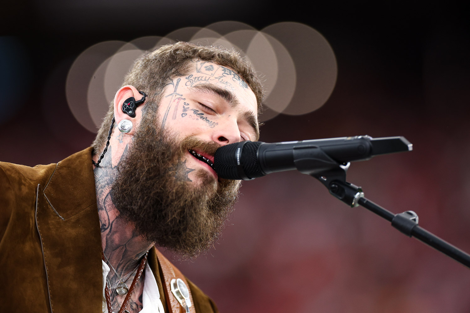 Post Malone sings “America the Beautiful” prior to the NFL Super Bowl 58 football game between the Kansas City Chiefs and the San Francisco 49ers, Sunday, Feb. 11, 2024, in Las Vegas.