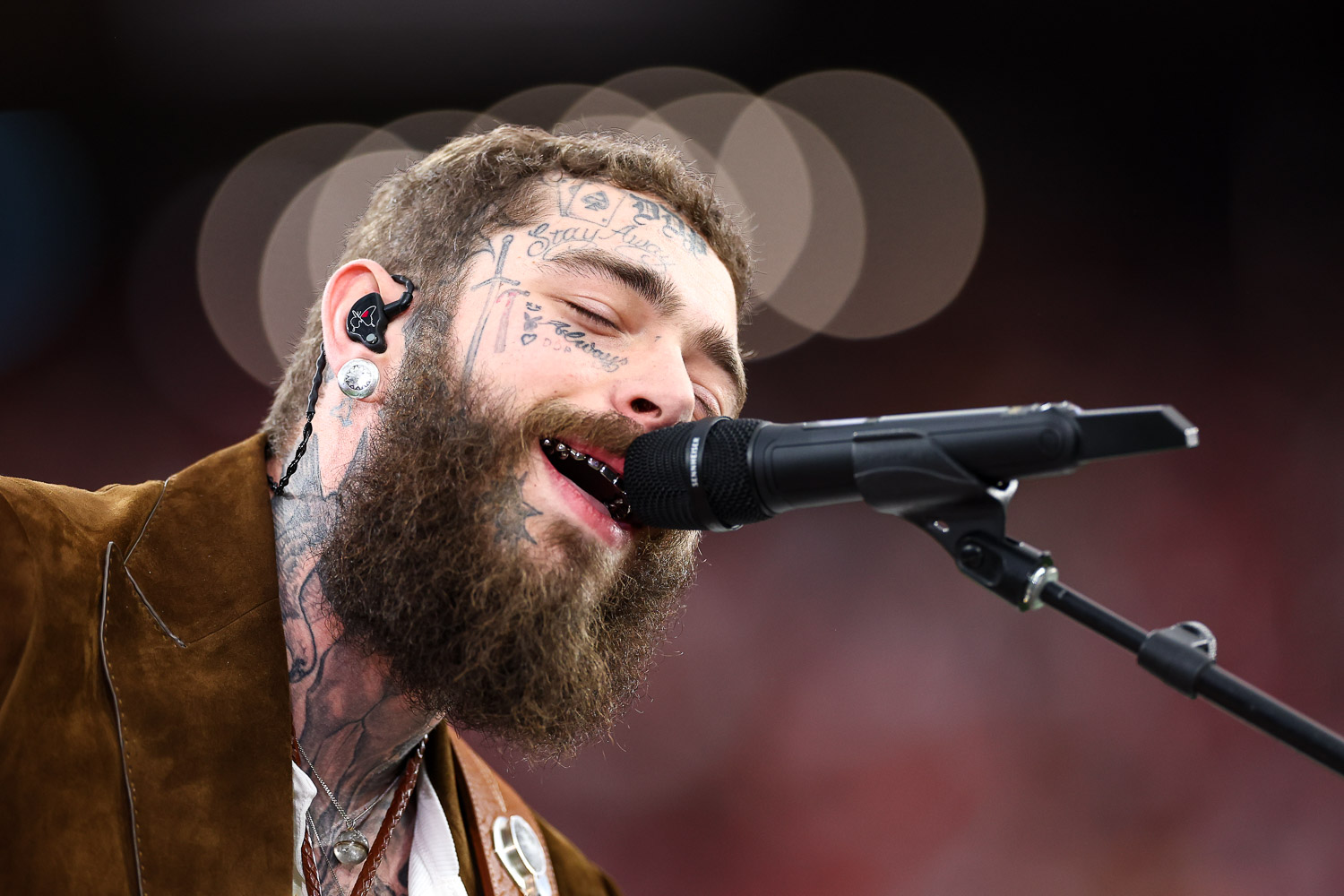 Post Malone sings “America the Beautiful” prior to the NFL Super Bowl 58 football game between the Kansas City Chiefs and the San Francisco 49ers, Sunday, Feb. 11, 2024, in Las Vegas.