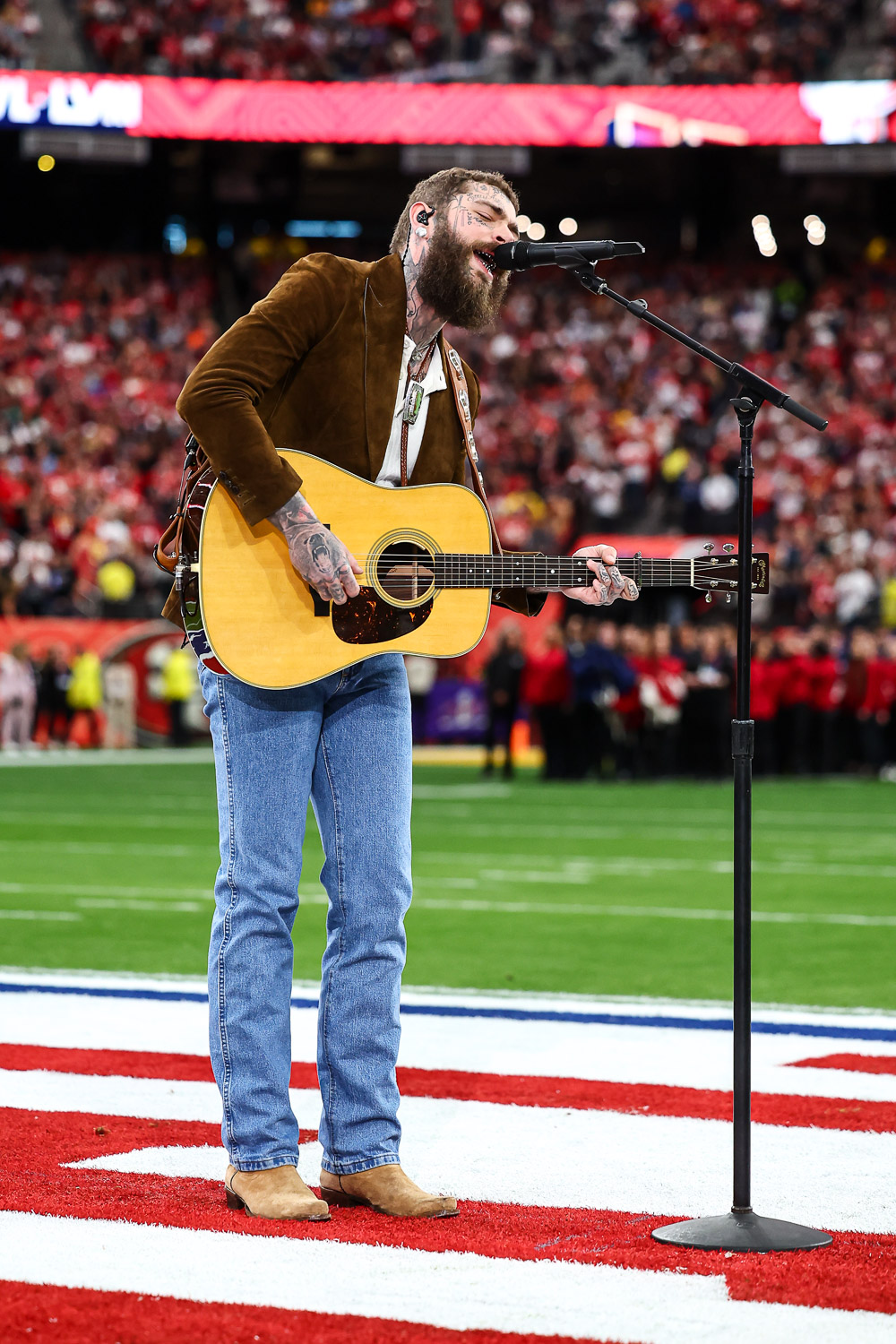 Post Malone sings “America the Beautiful” prior to the NFL Super Bowl 58 football game between the Kansas City Chiefs and the San Francisco 49ers, Sunday, Feb. 11, 2024, in Las Vegas.