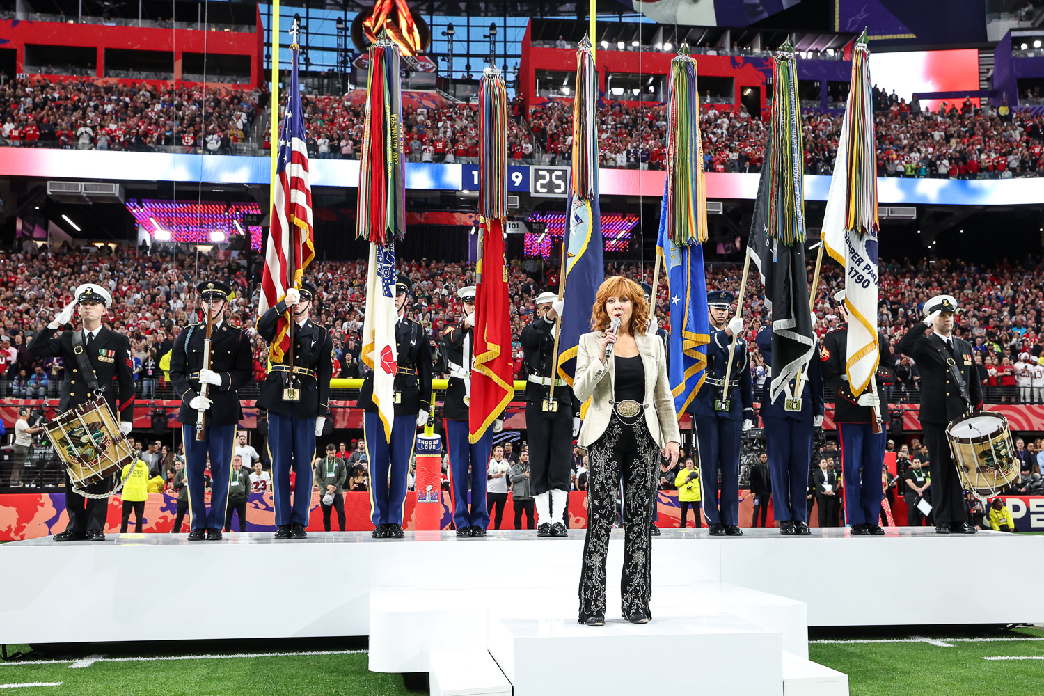 Reba McEntire sings the national anthem prior to the NFL Super Bowl 58 football game between the Kansas City Chiefs and the San Francisco 49ers, Sunday, Feb. 11, 2024, in Las Vegas.