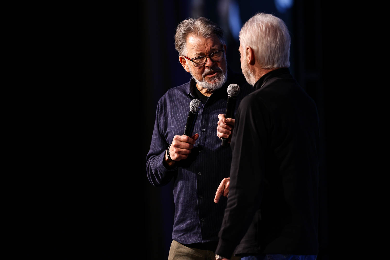 Brent Spiner and Jonathan Frakes during a panel on Saturday at the 2023 Planet Comicon in Kansas City, Missouri on March 18, 2023.