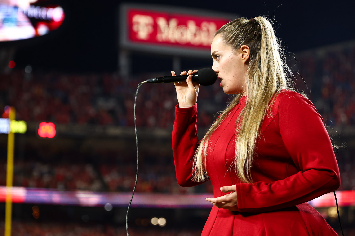 Grace Kinstler singing the National Anthem prior to an NFL football game against the Detroit Lions, Sunday, October 12, 2025 in Kansas City.